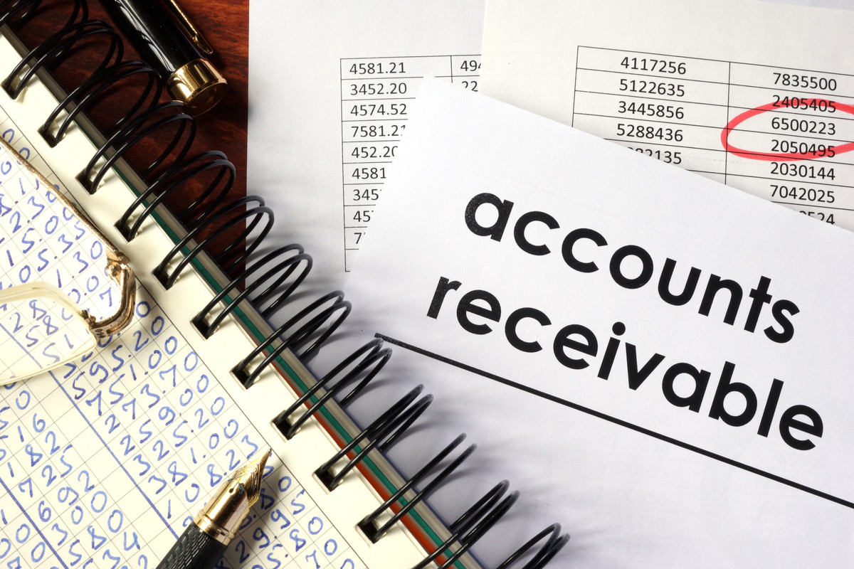 Notebook showing accounts receivable payments.